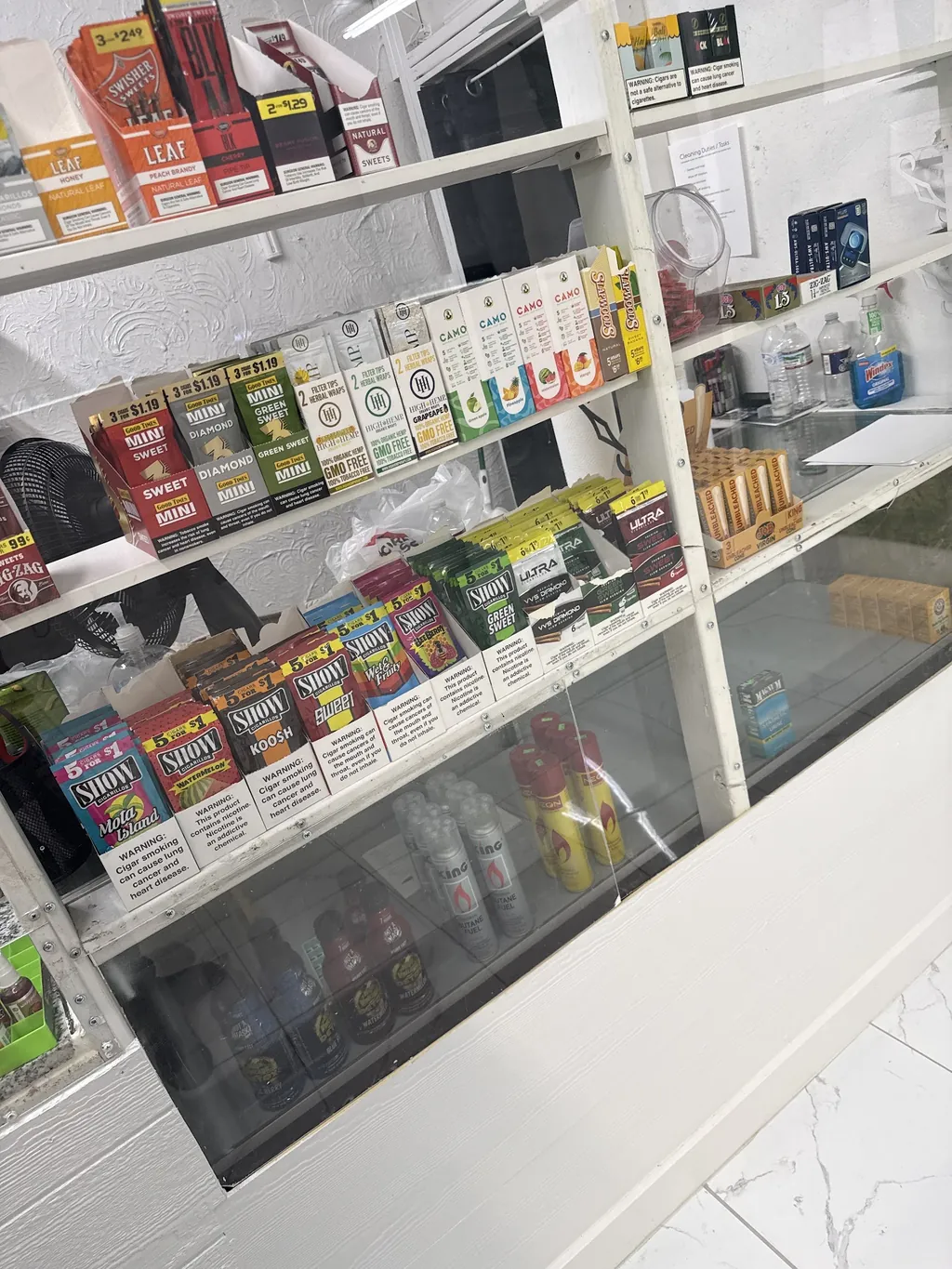 Shelves of wraps, papers and snacks at Kush Kingdom