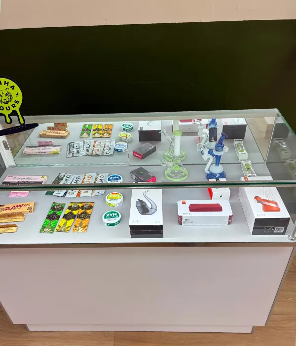 Smoke shop accessories, glass and papers, at The Flower Shop Dispensary, North Houston.