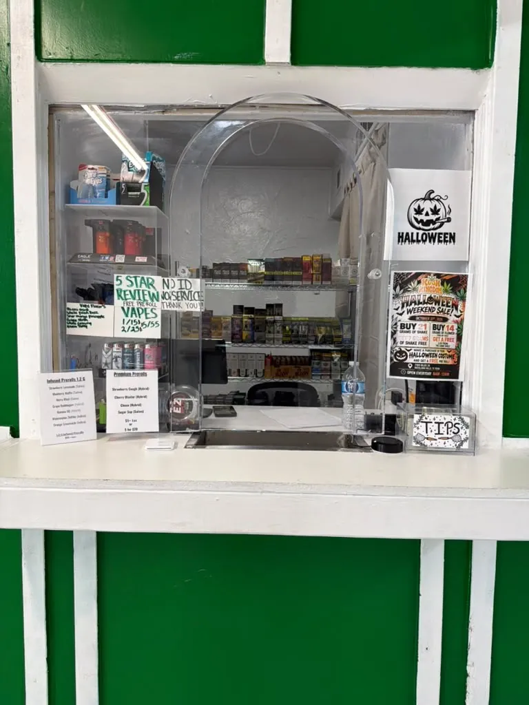 The order window with shelves of products behind it at Kush Kingdom